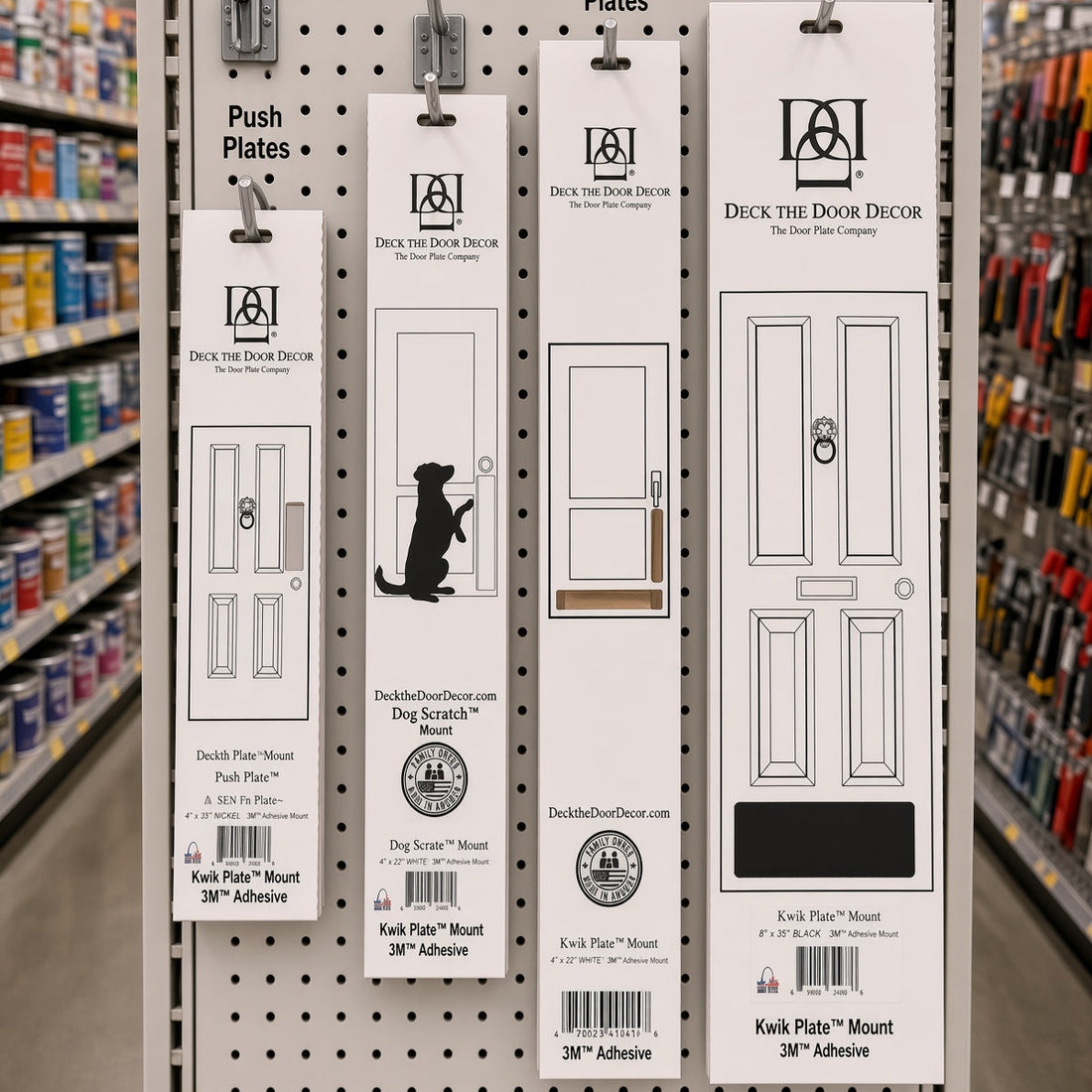 A retail display board showing various door plate styles and brands, including Kick Plate, Dog Scratch Plate, Storm Door Plates, and Kick Plates, with a prominent sign reading 'Door Plates' at the top.